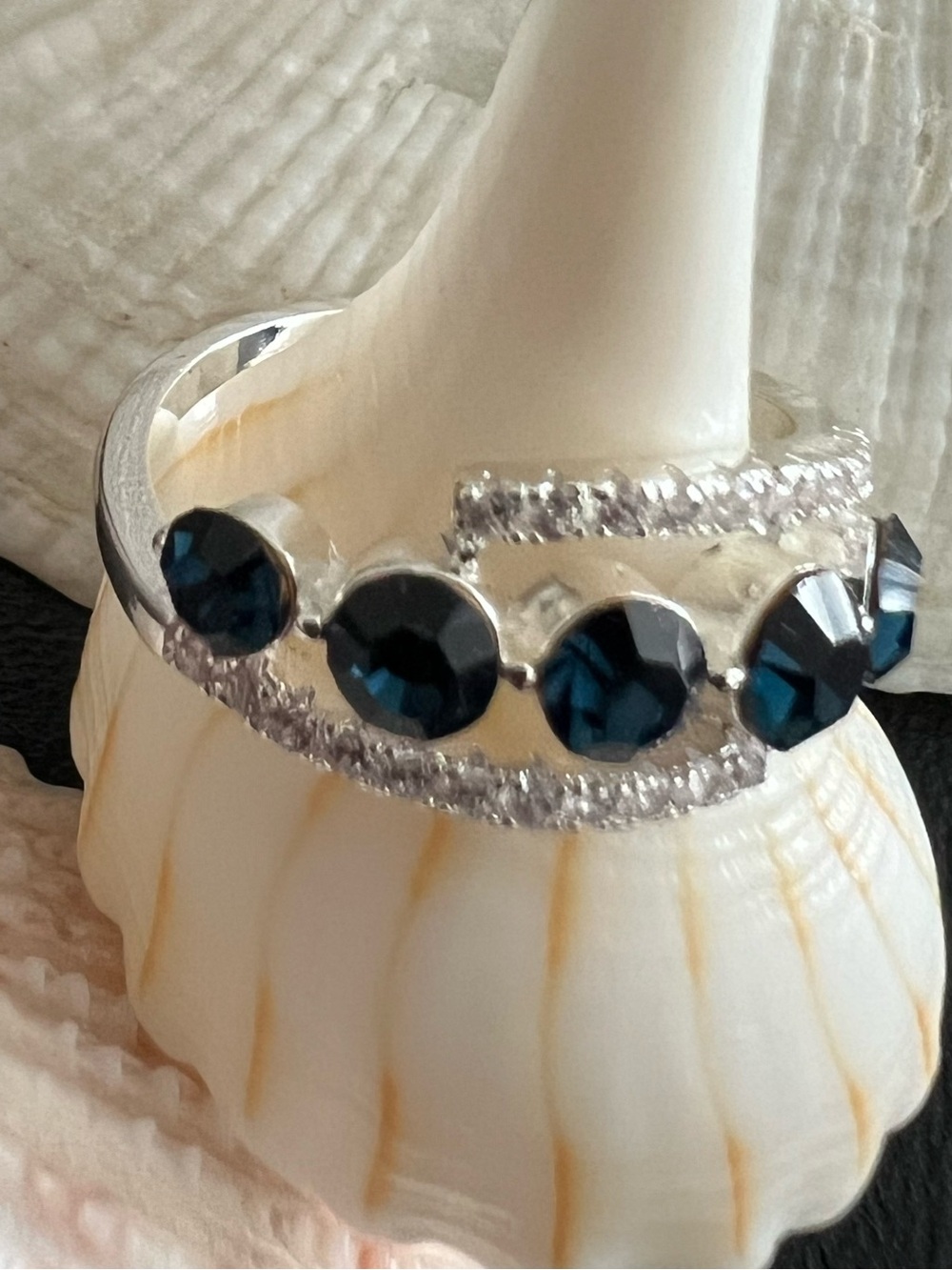 sliver Ring with dark blue stones 
Size 7
